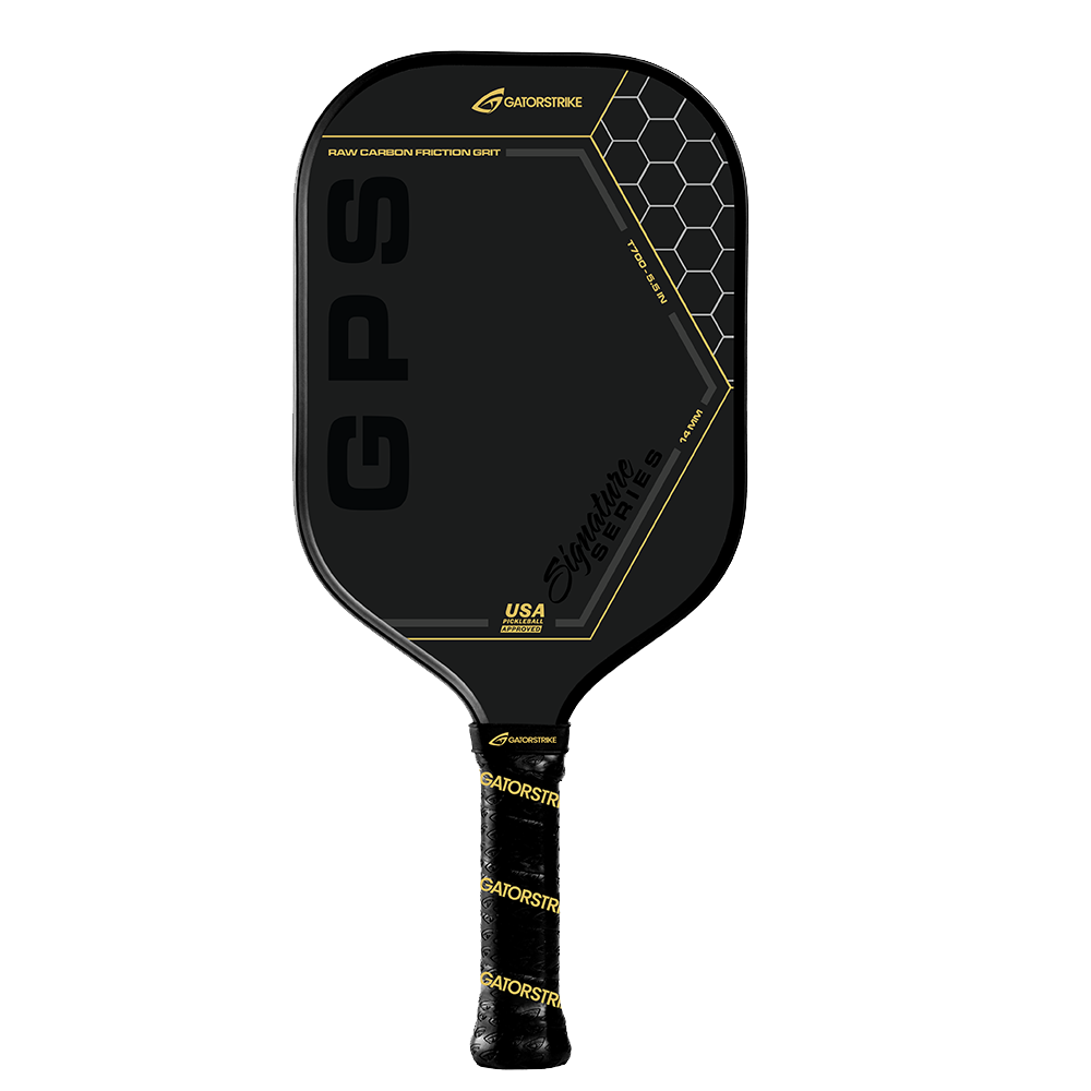 The GATORSTRIKE™ Gold Pro Series is a black carbon fiber paddle with gold accents, hexagon patterns, GPS lettering, GATORSTROKE branding on the face and grip, and a control core for enhanced playability.