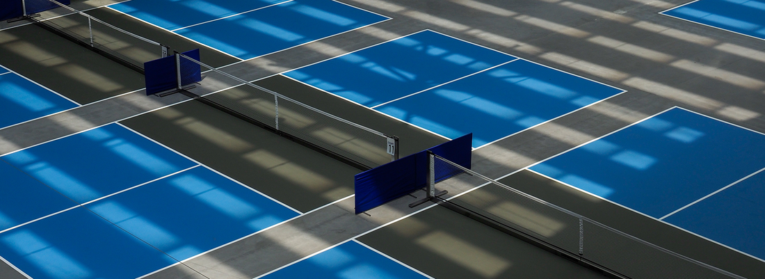 Indoor vs Outdoor Pickleball Balls: How Hole Patterns and Plastics Change Flight and Bounce