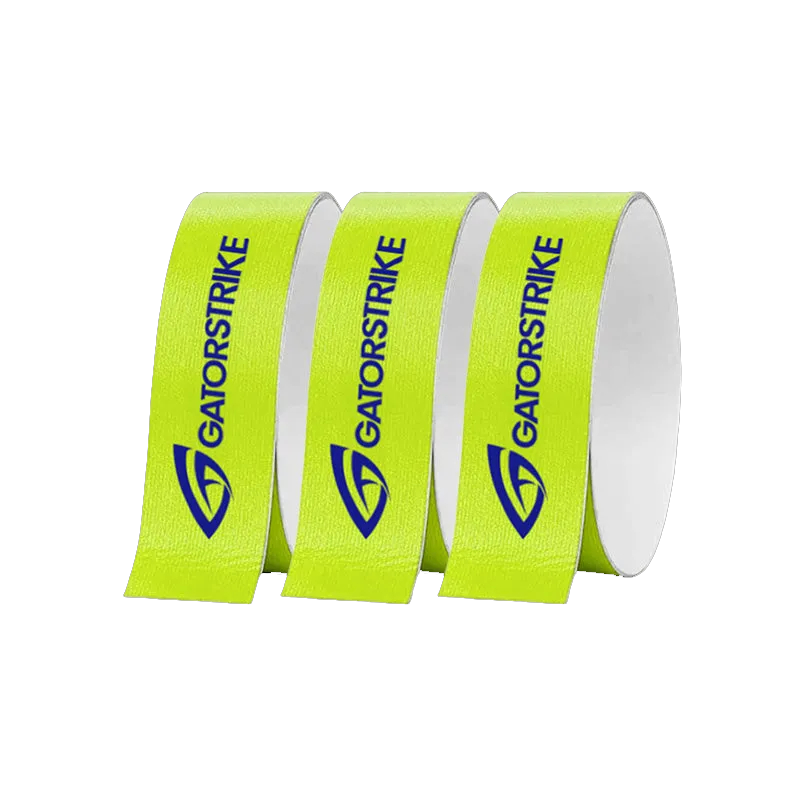 Three upright rolls of bright yellow GATORSTRIKE paddle edge protection tape are displayed side by side, each with the blue GATORSTRIKE logo and vertical text plus a stylized “G” beneath the brand name, all set against a plain white background.