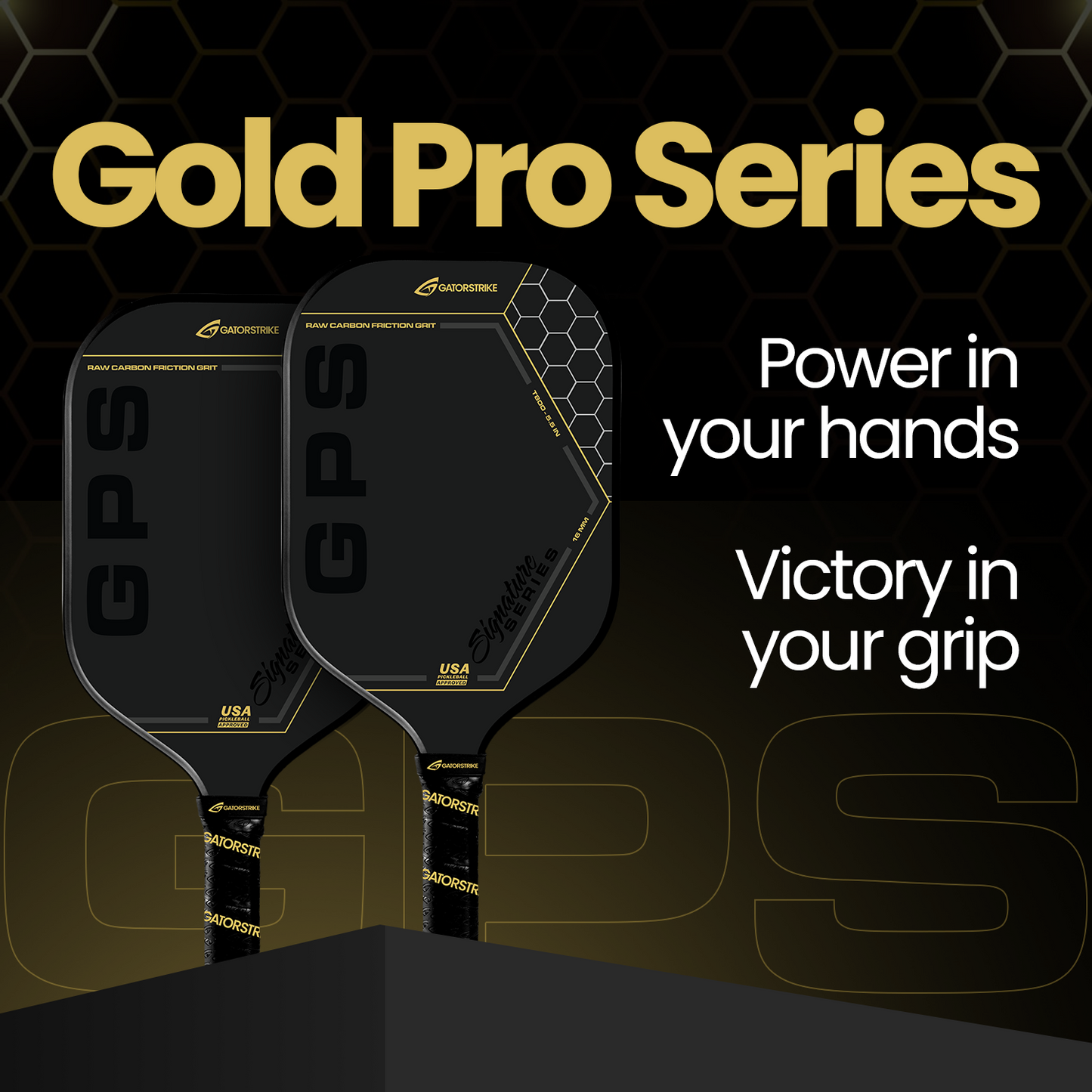 Two black carbon fiber GATORSTRIKE™ Gold Pro Series paddles with gold and hexagon accents feature a control core. "Power in your hands" and "Victory in your grip" stand out on a sleek, dark background.