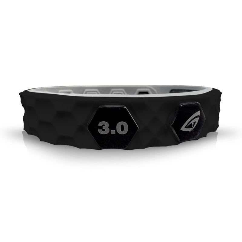 The GATORSTRIKE™ SUPR Band is a black silicone pickleball paddle ID band with a hexagonal texture, "3.0" and a small hexagon logo on the front, and a gray inner lining for a secure fit and to prevent paddle mix-ups.