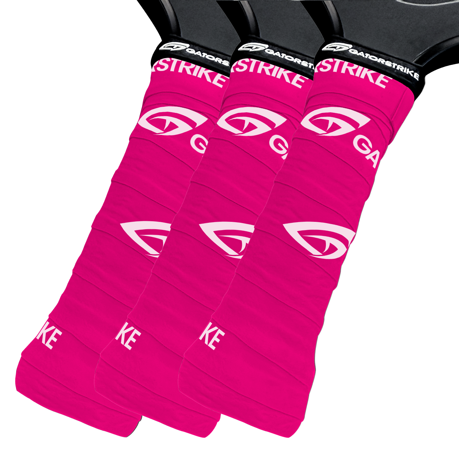 Three black tennis racket handles are wrapped in bright pink GATORSTRIKE overgrips with the white Gatorade “G” logo and stylized lines, providing a secure hold. The rackets are aligned side by side on a plain white background.