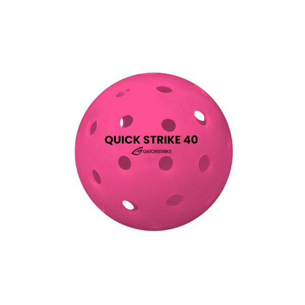 A bright pink GATORSTRIKE Quick Strike 40 Pickleball with multiple holes and QUICK STRIKE 40 and GATORSTRIKE printed in black, designed for ultimate consistency in competitive play, shown on a plain white background.