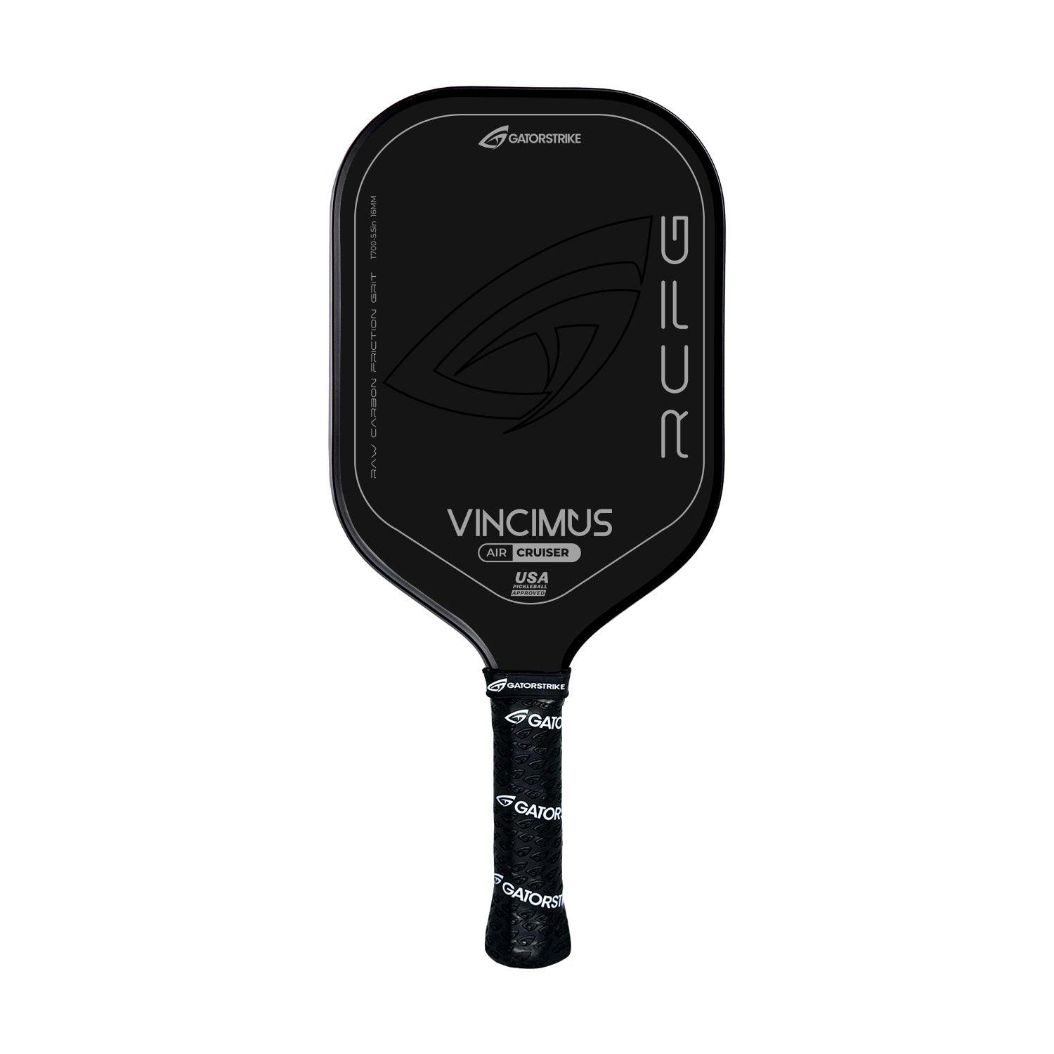 A black carbon fiber pickleball paddle from GATORSTRIKE with a stylized eye logo. The face displays VINCIMUS AIR CRUISER and RCFG, and the handle is wrapped in black grip tape with repeating GATORSTRIKE branding.